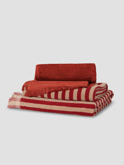 Stack of Sandstone Red Pembroke Stripe and Fringe Edge Towels