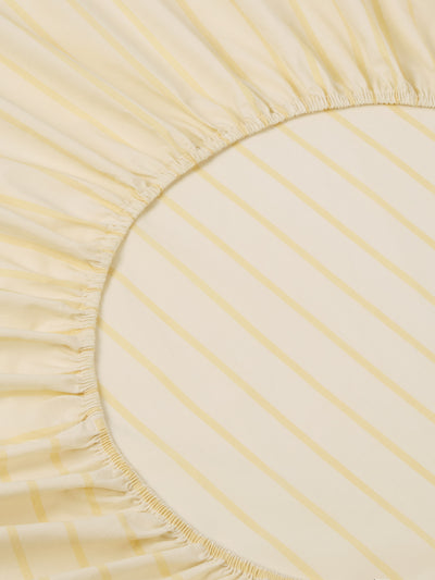 Close up Butter Yellow Slumber Stripe Fitted Sheet