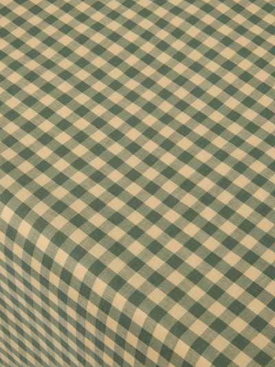 Close up of Elm Green & Butter Yellow Gingham Linen Blend Tablecloth